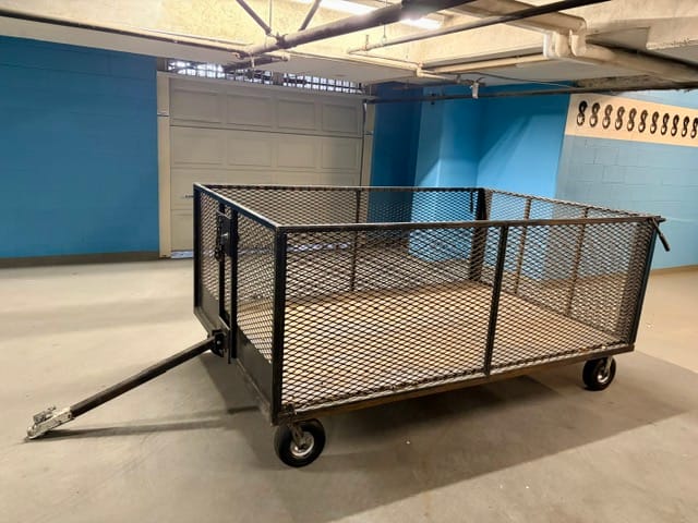 XeroWaste Solutions | tote trailer or bin trailer. Use with dumspter tug, dumpster mover, waste bin tug, dumpster puller. Available in Canada and USA from XeroWaste Solutions and works with the V-Move dumpster mover or waste bin tug